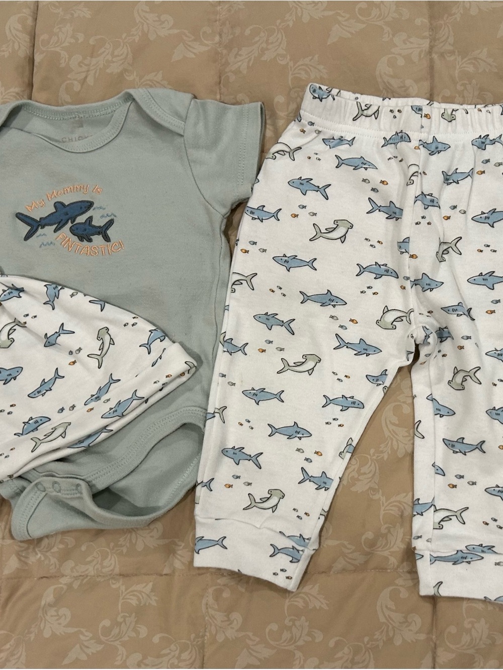 chick pea light blue baby top with navy shark embroidery